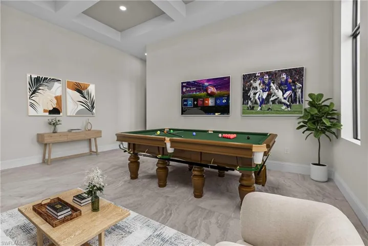 Recreation room featuring coffered ceiling, beamed ceiling, pool table, and recessed lighting
