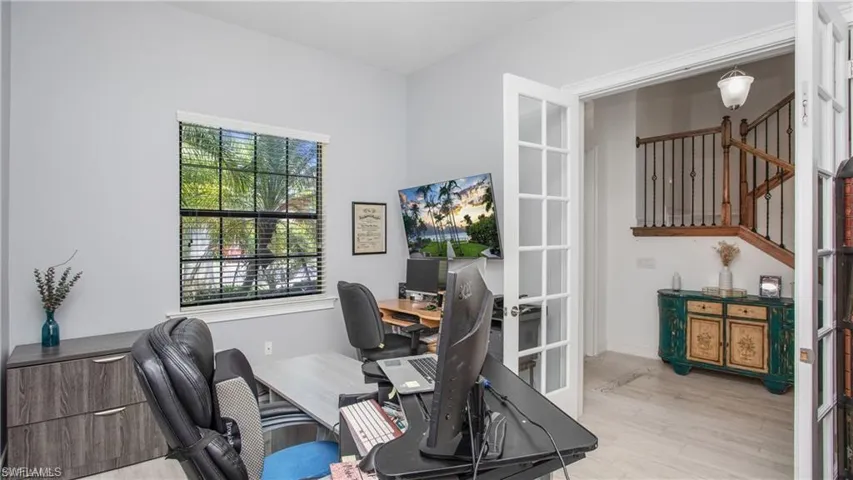 Office area featuring wood finished floors and french doors