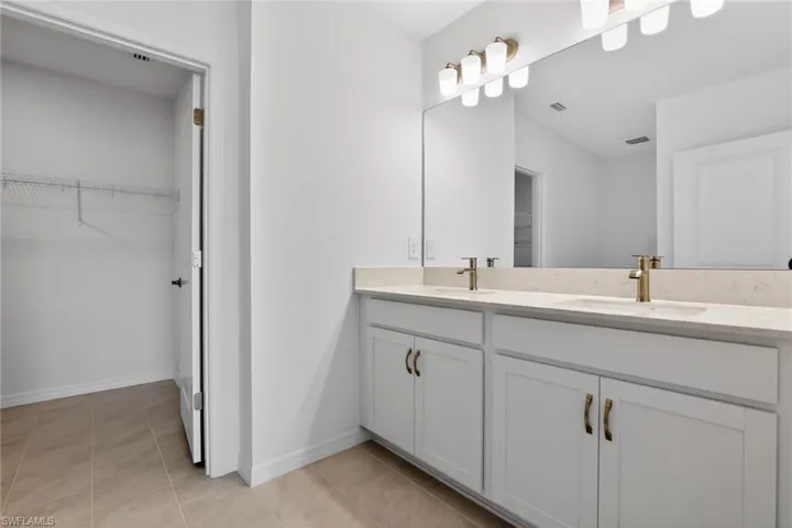 Primary Bath-Photo description represents the model home of same floor plan.