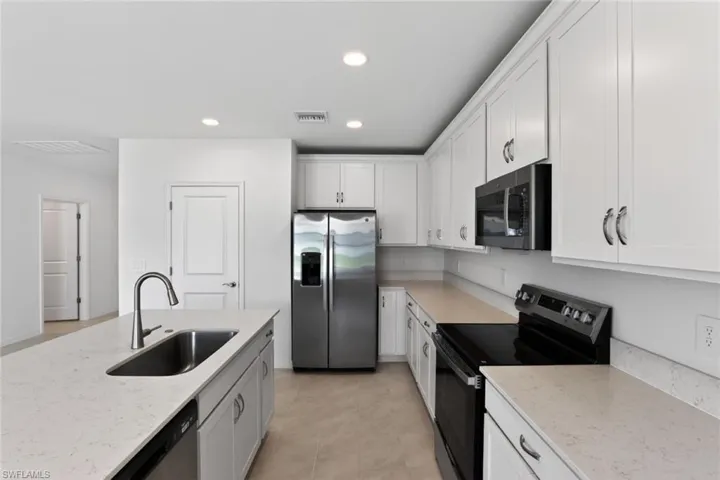 Kitchen-Photo description represents the model home of same floor plan.