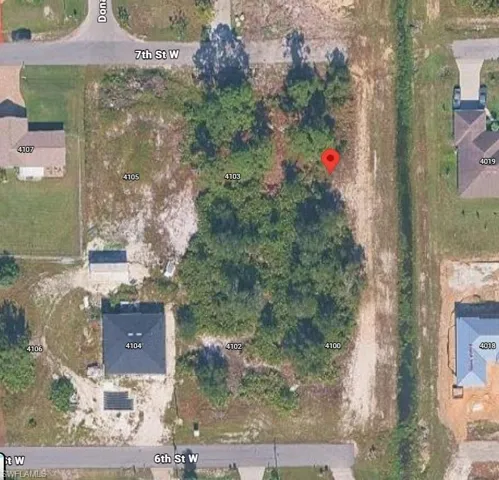 Aerial Map. Displaying the property's boundaries and surrounding parcels with identifying numbers
