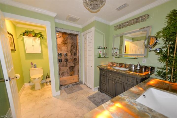 VIEW OF MASTER BATH FROM ENTRY OF BATHROOM