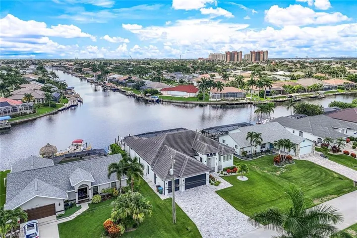 Aerial view of residential area with a nearby body of water