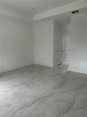 View of tiled empty room