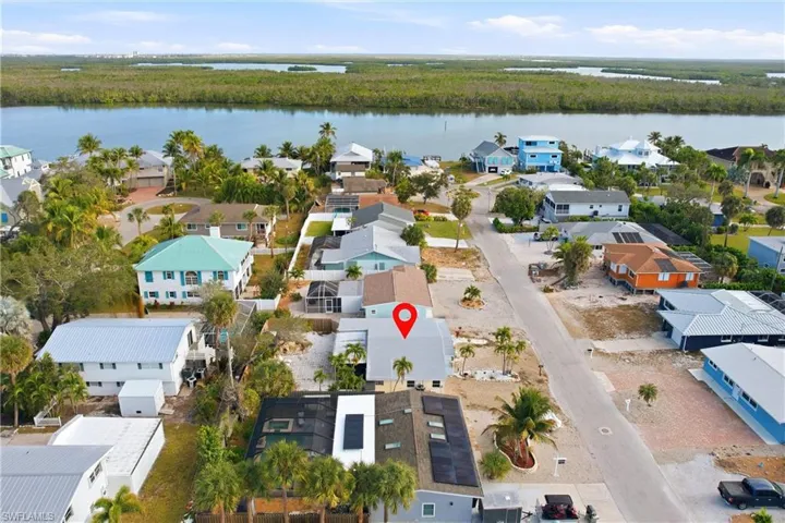 Aerial view of residential area with a large body of water
