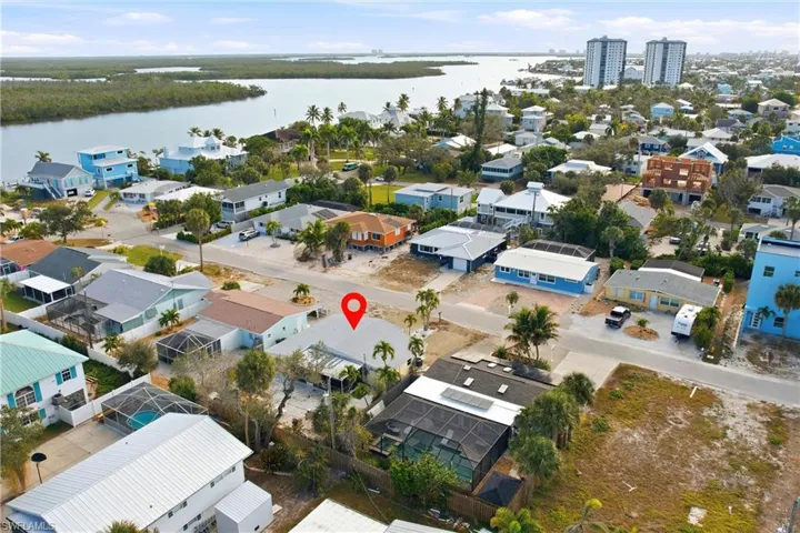 Aerial view of residential area with a large body of water