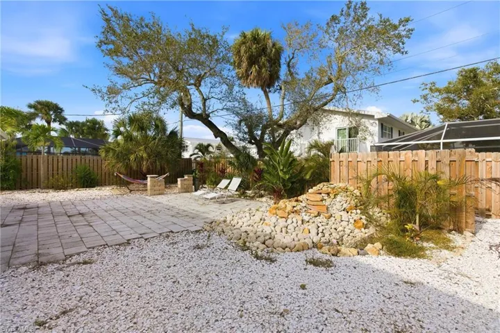 Fenced yard with a patio area
