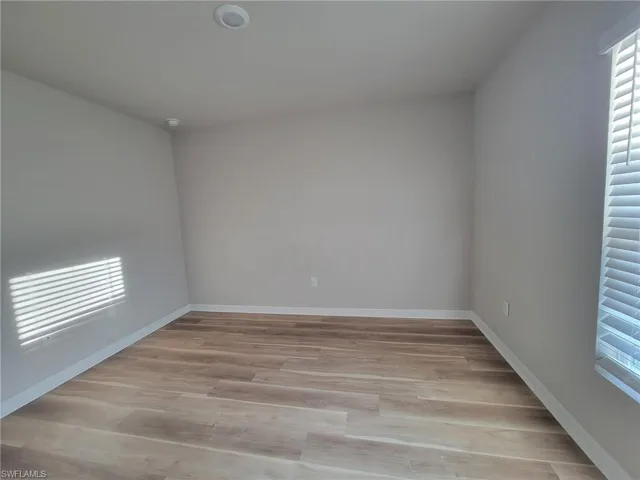 Unfurnished room featuring light hardwood / wood-style floors