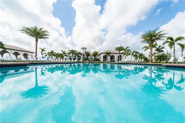 Community pool with a patio area