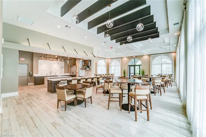 Dining space with recessed lighting, light wood-type flooring, and coffered ceiling