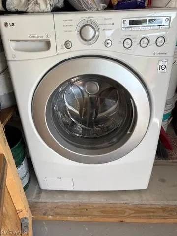 Laundry room featuring washer / clothes dryer
