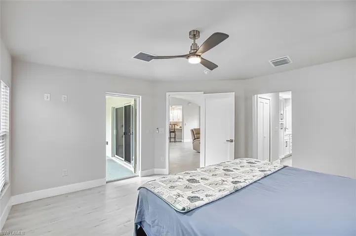 Bedroom featuring light wood-style floors and a ceiling fan
