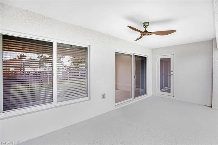 View of patio with ceiling fan