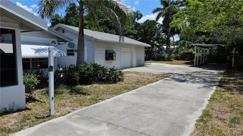 View of home's exterior with a garage