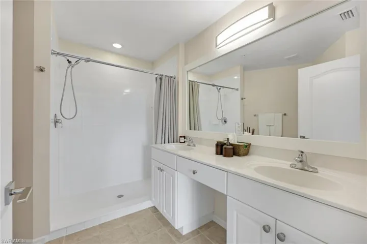 dual sinks and step-in shower