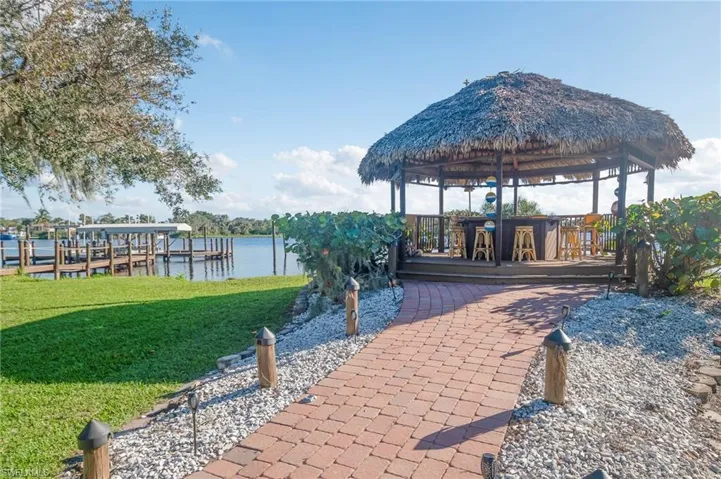 Inviting Tiki Bar with plenty of seating to enjoy waterside cocktails and amazing sunsets along the river.