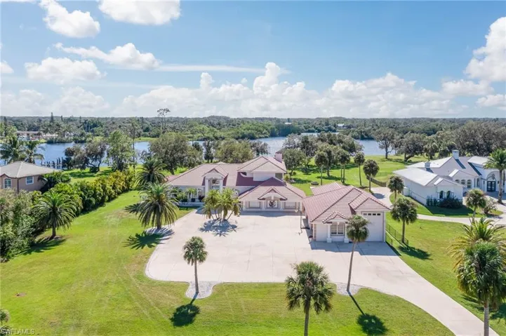 Spectacular view of this amazing property set in the country community of Alva along the Caloosahatchee River with direct access to the Gulf or access to Lake Okeechobee and the Atlantic Ocean through the Lock system.   This property is the definition of elegant peacful living at it's best!