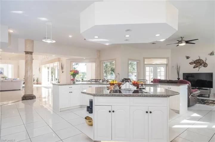 View from kitchen facing the family room , dining area and living room.
