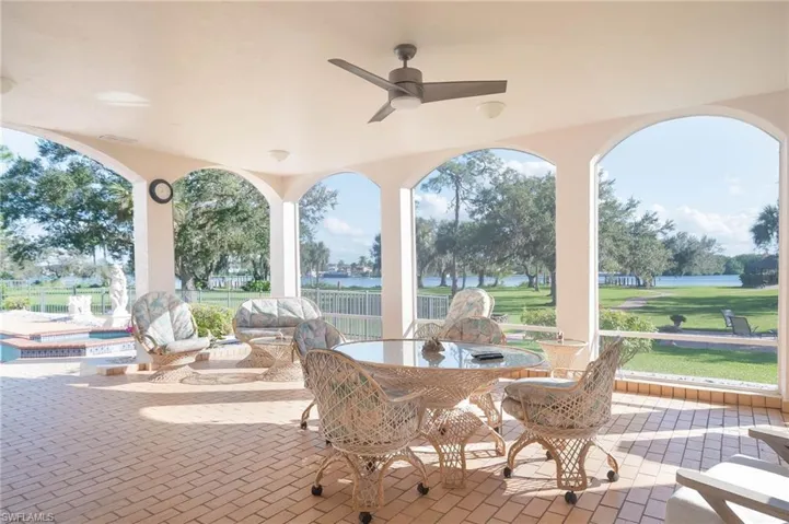 Perfect place to sit back and enjoy the view of the pool, grounds and river.