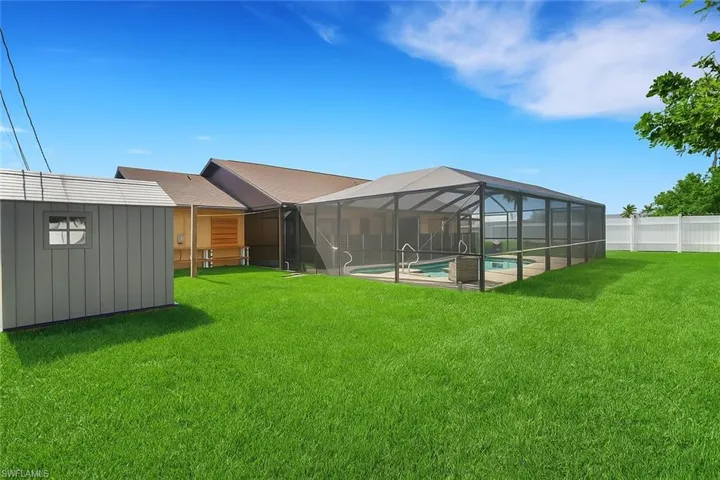 Fully fenced backyard with recently installed storage shed