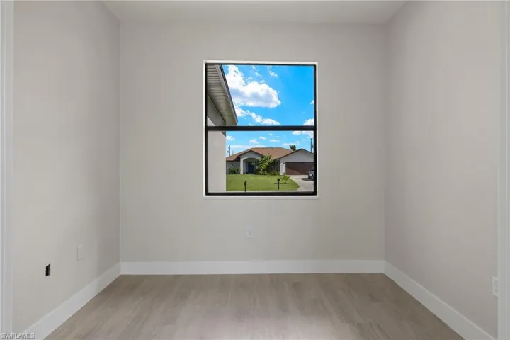 Empty room with light wood-type flooring