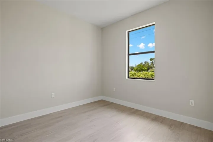 Spare room featuring light hardwood / wood-style floors