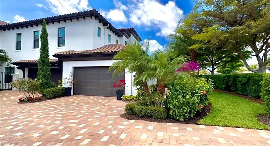 Attached 2-Car Garage with Private Elevator to Main Living Area.