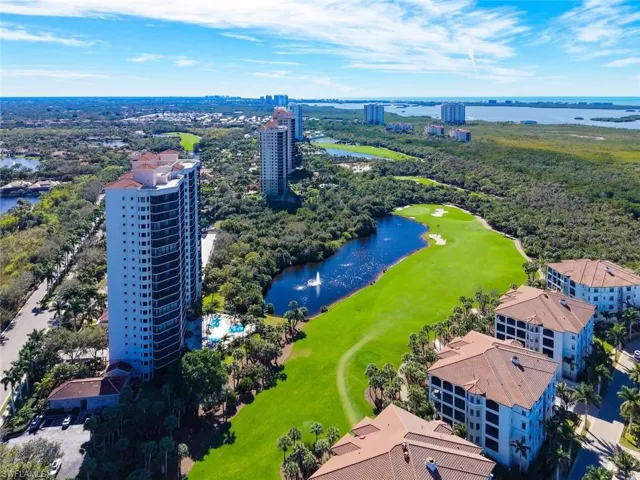 Aerial view of a large body of water and a local golf course