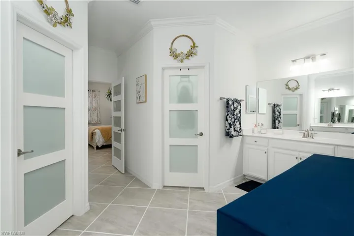 Upgraded 3 lite doors on master bedroom closets and an upgraded 5 lite door on the bathroom itself