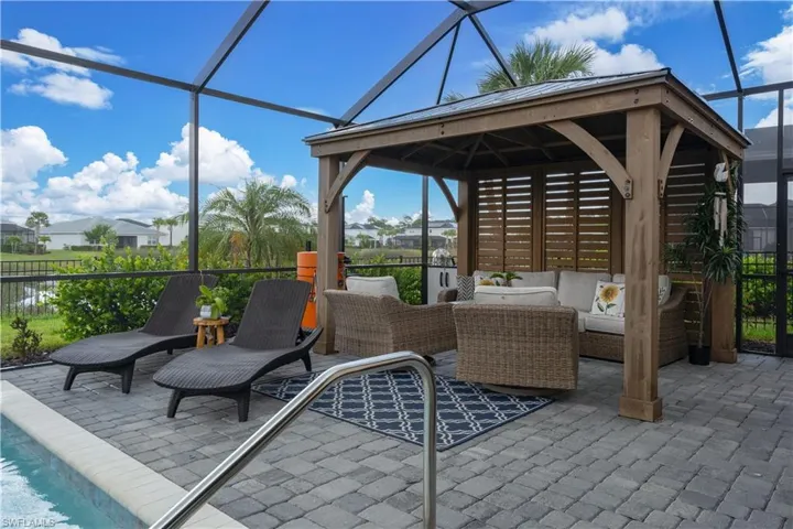 10 x 10 Gazebo, how gorgeous is this space in your screen lanai to enjoy year round.