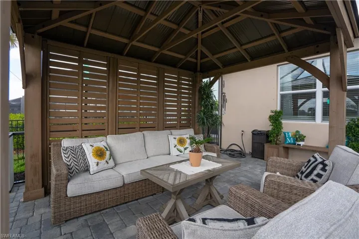 outdoor hangout area with gazebo in your screen lanai space offering additional outdoor space to enjoy with friends and family