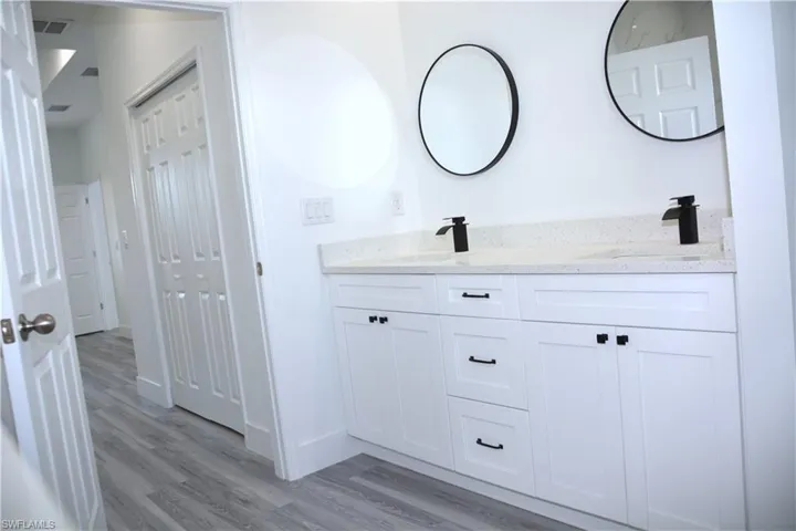 Bathroom featuring Dual His & Hers Sink