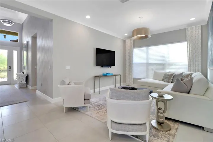 Tiled living room with plenty of natural light