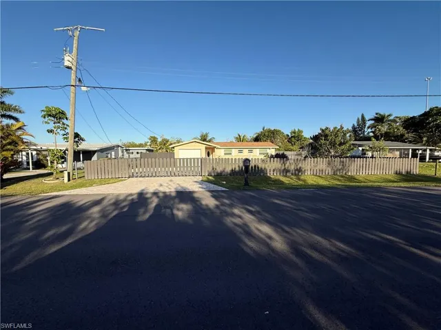 View of front of home with a fenced front yard