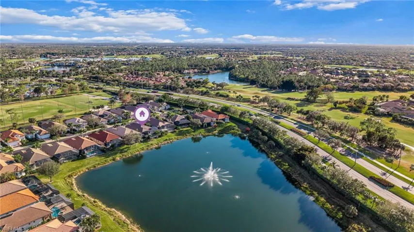 Aerial view of property's location with lake view