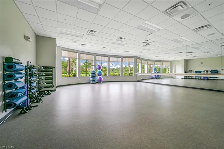 Exercise room featuring a paneled ceiling