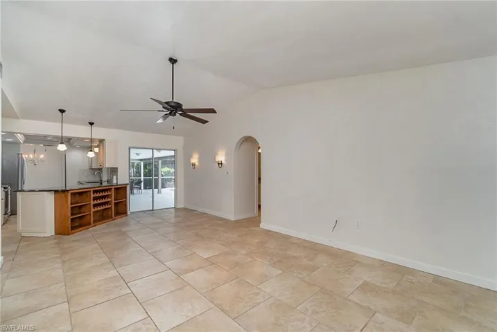 Family room with pocketing sliding glass doors to the pool area.