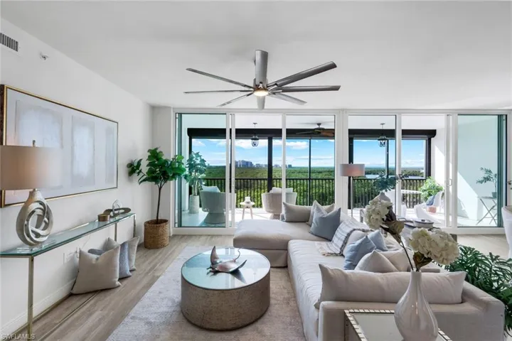 Spacious sun drenched living room with gulf view
