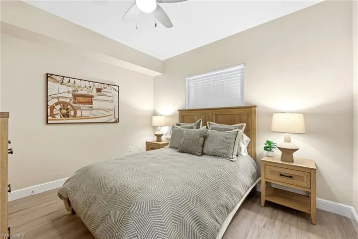 Bedroom featuring light wood-type flooring and ceiling fan
