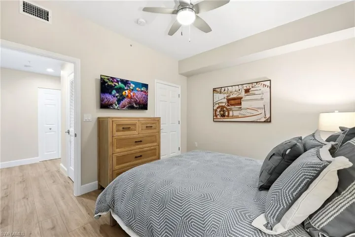 Bedroom featuring light wood-style floors and ceiling fan