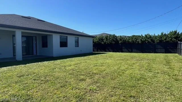 View of yard with a patio