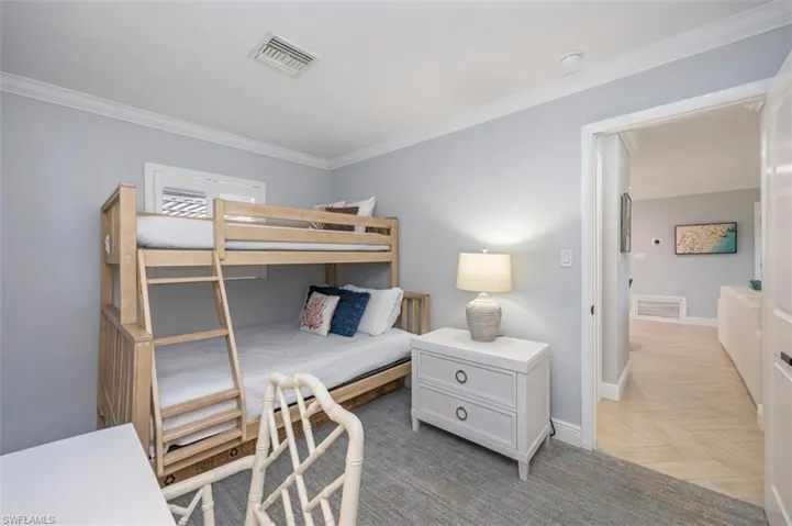 Third Bedroom with a Bunk that has a Fulli size bed on the bottom and a twin on the top.