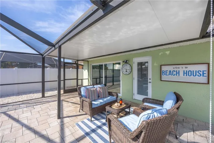 Enjoy your cool beverage or morning coffee here with a view of your pool/spa.**The covered lanai assures your comfort rain or shine!