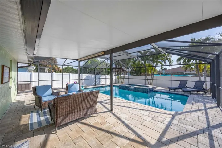 Enjoy your cool beverage or morning coffee here with a view of your pool/spa.**The covered lanai assures your comfort rain or shine!