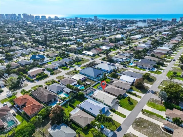 View of property location with nearby suburban area