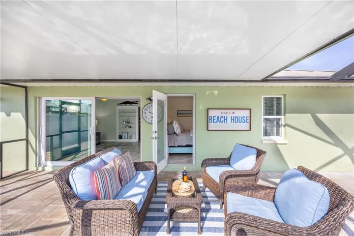 Enjoy your cool beverage or morning coffee here with a view of your pool/spa.**The covered lanai assures your comfort rain or shine!