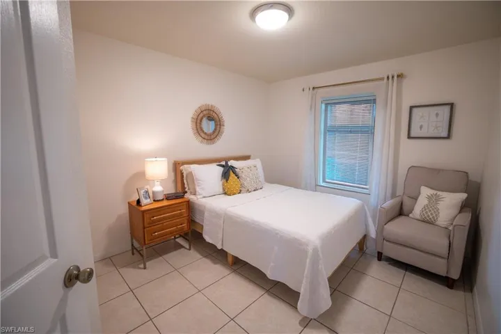 Bedroom featuring light tile patterned floors