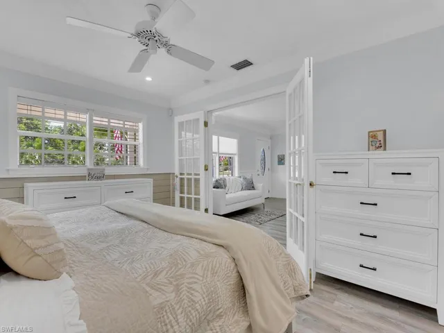Master Bedroom off living room, multiple windows, french door