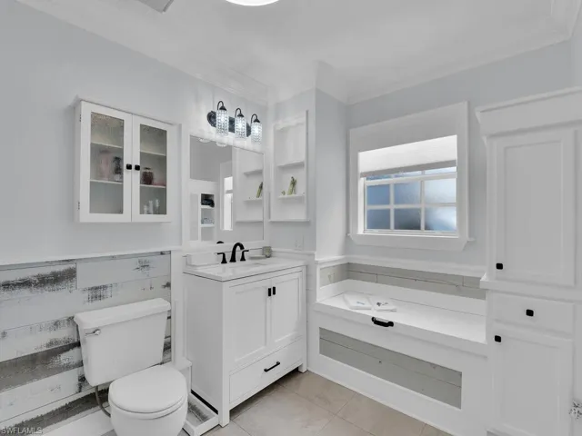 Master bathroom with additional handcrafted built-cabinents for extra storage.