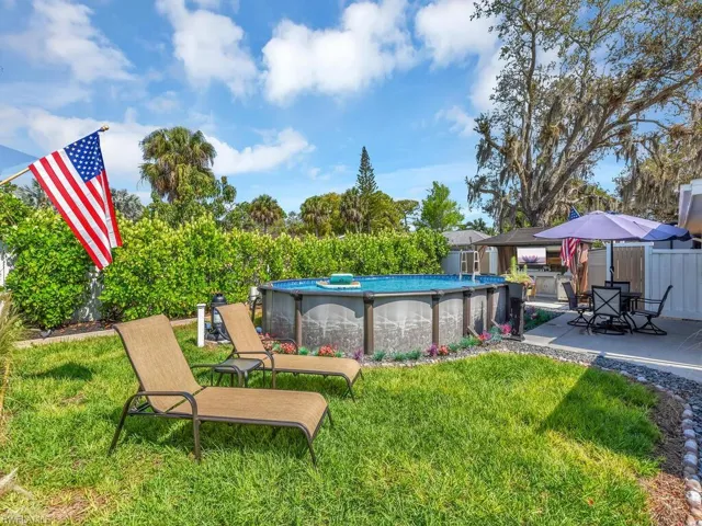 View of yard with pool and patio area